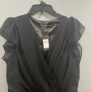 Black cocktail dress. Fully lined, midi length